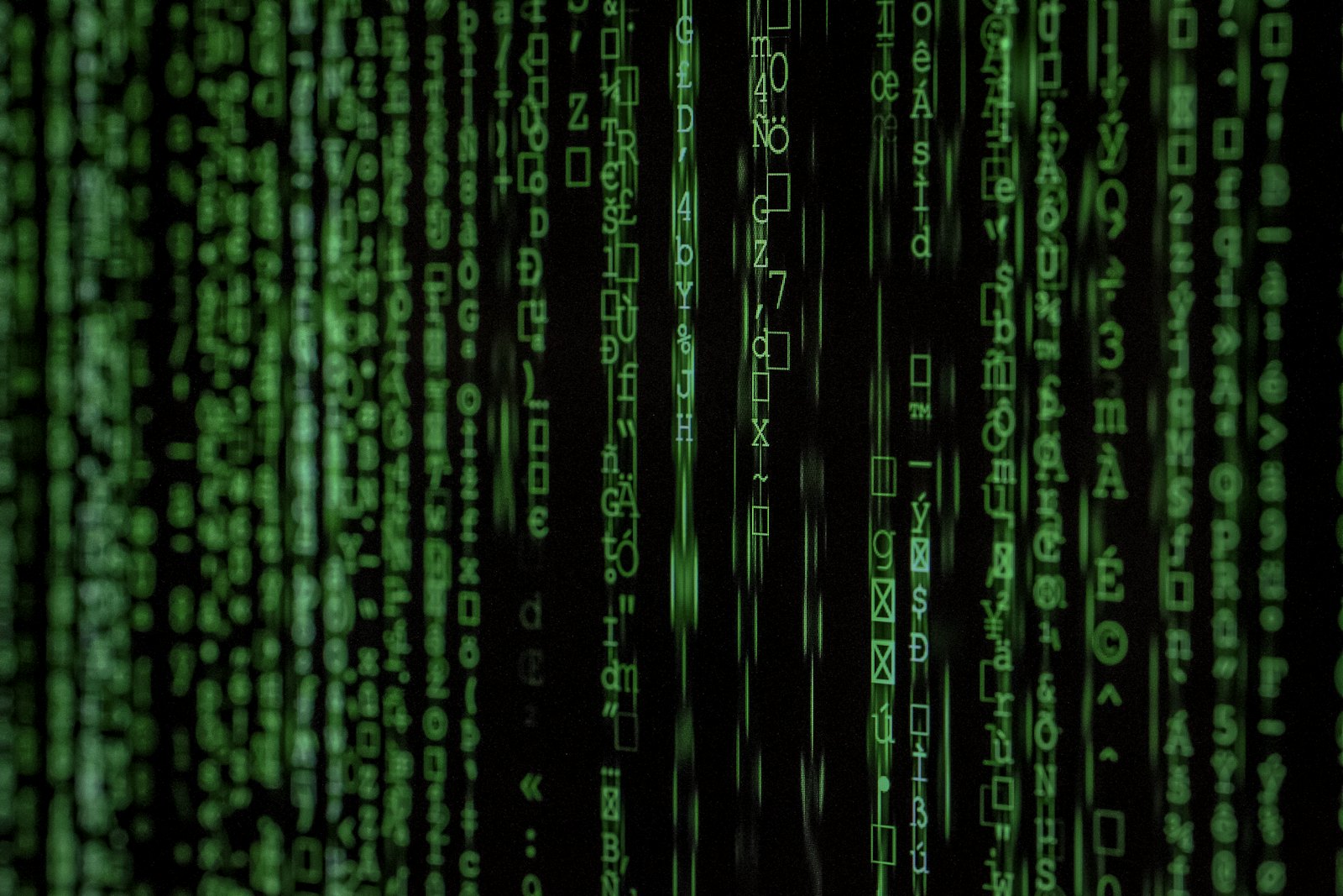 Streams of digital data on a dark screen